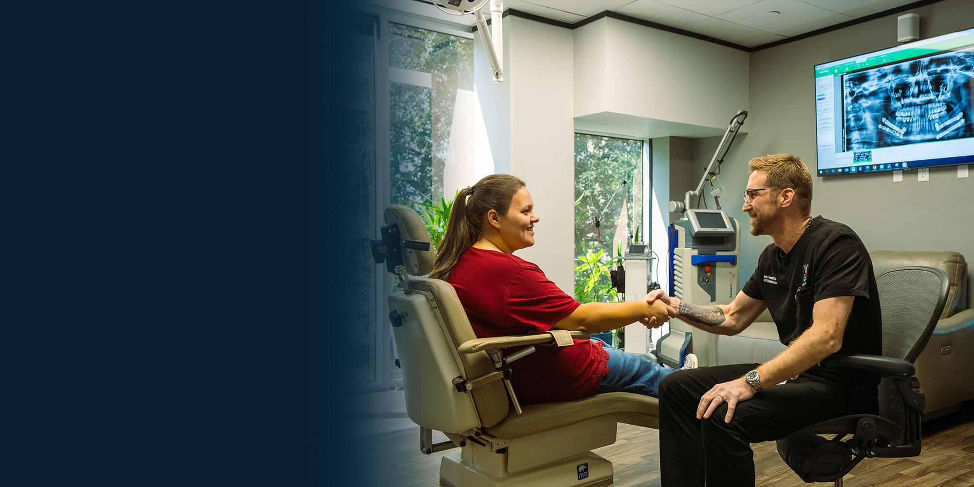 patient and doctor going over dental procedure information