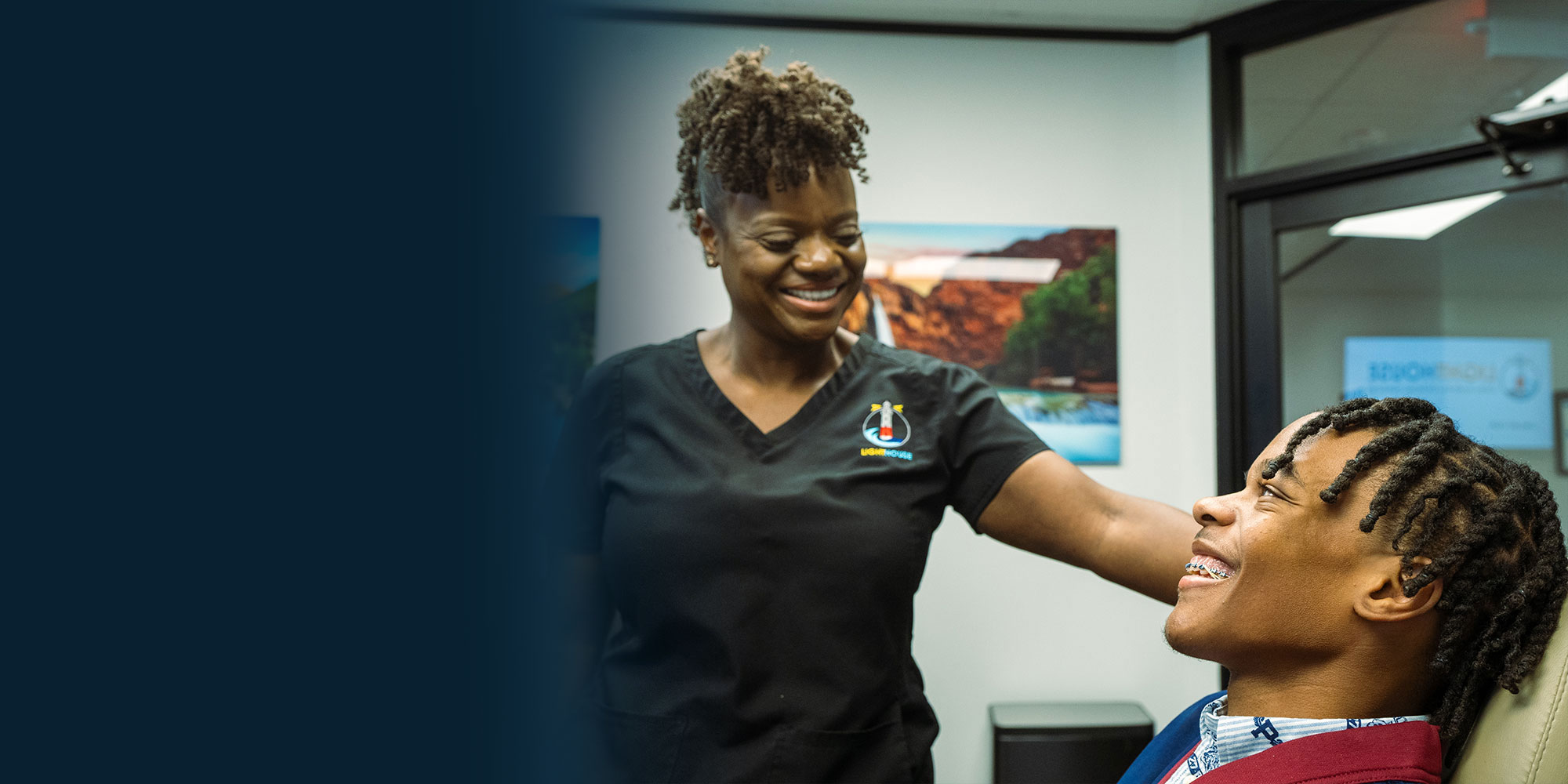 staff member going over dental procedure information with patient